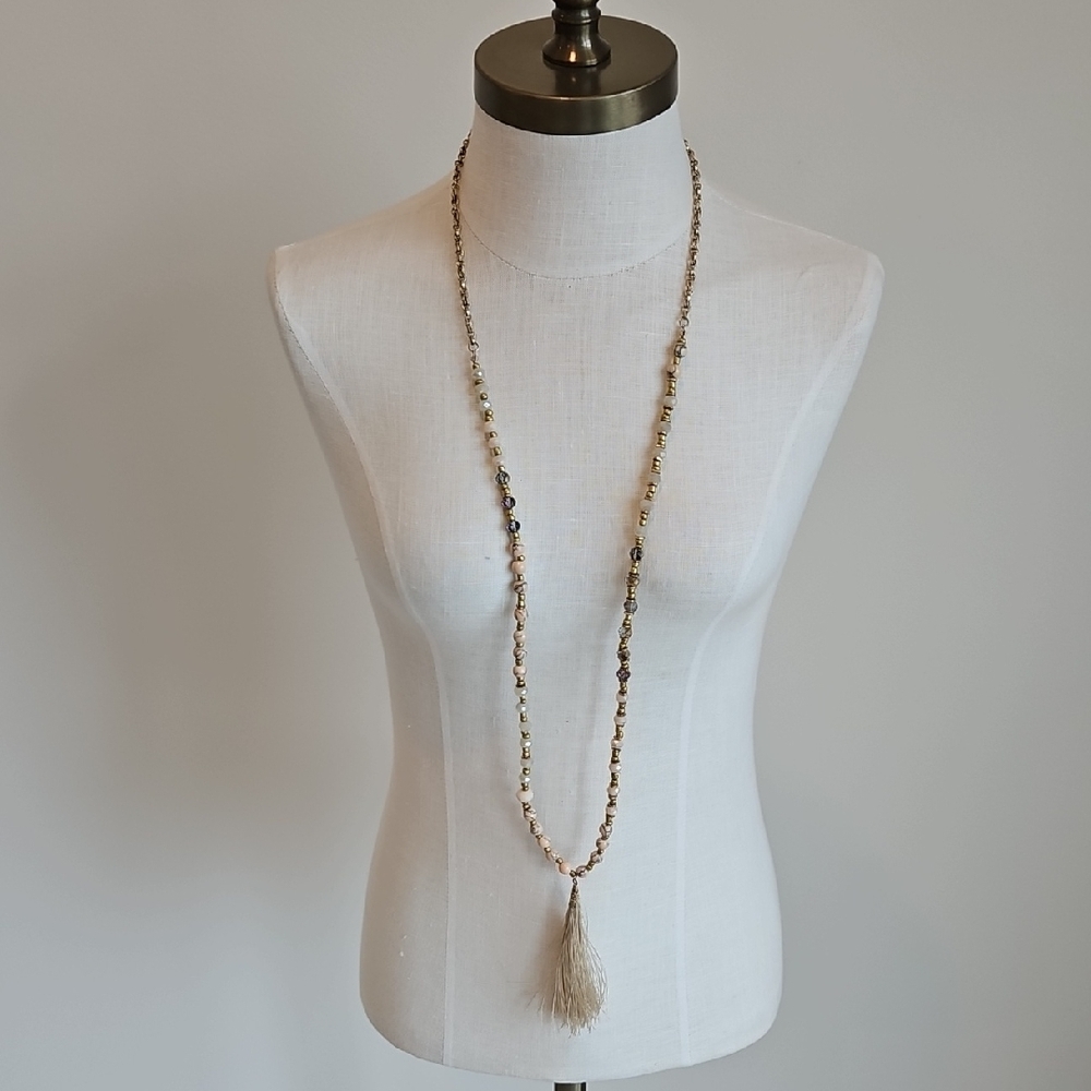 Elegant Gold and Silver Beaded Necklace with tassel